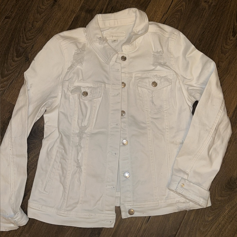 Distressed denim jacket
